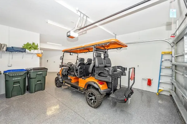 a view of a golf course with an ocean