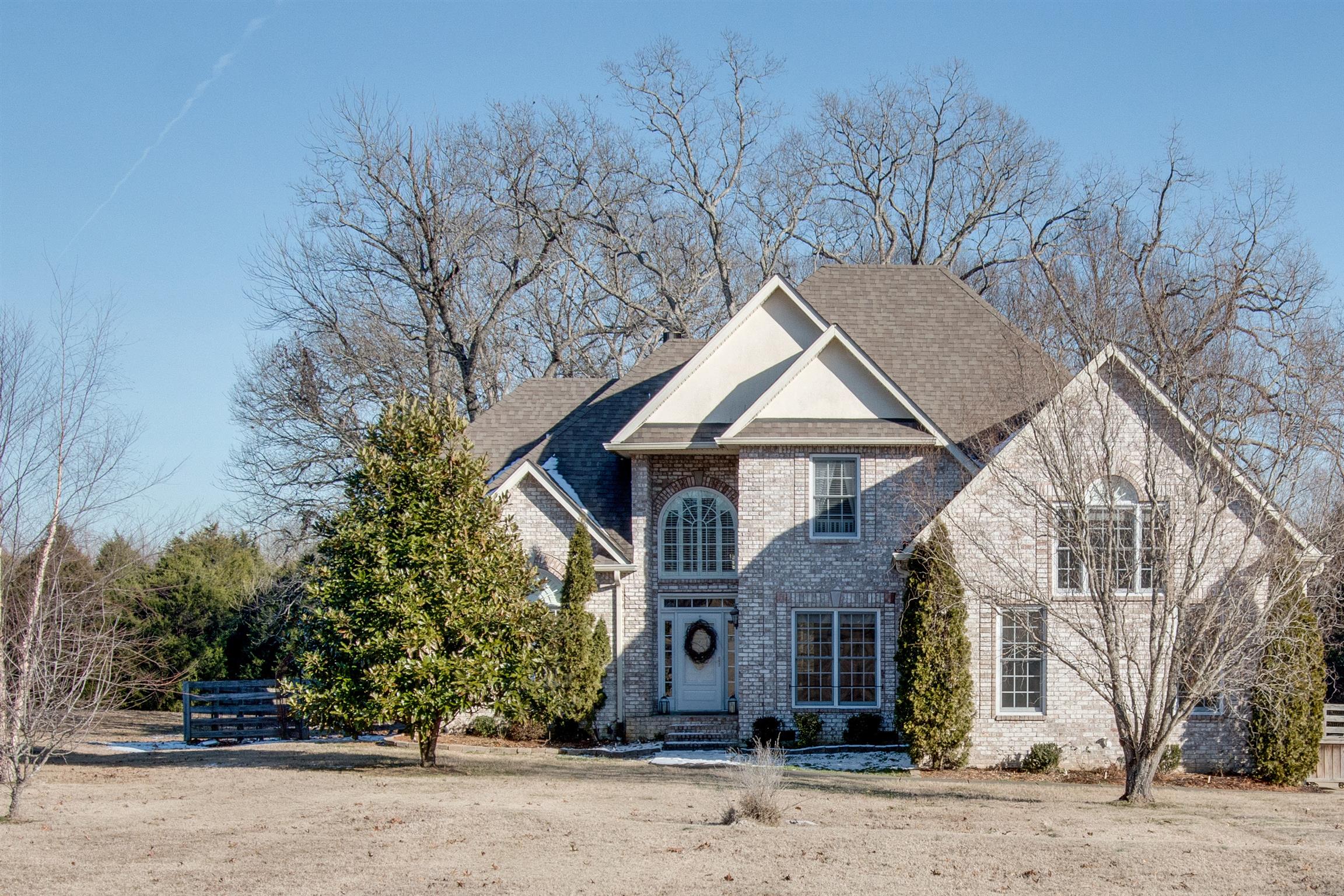210 Ridgewater Way Mount Juliet, TN 37122 - Photo 1 of 24 front view of a house with a dry yard