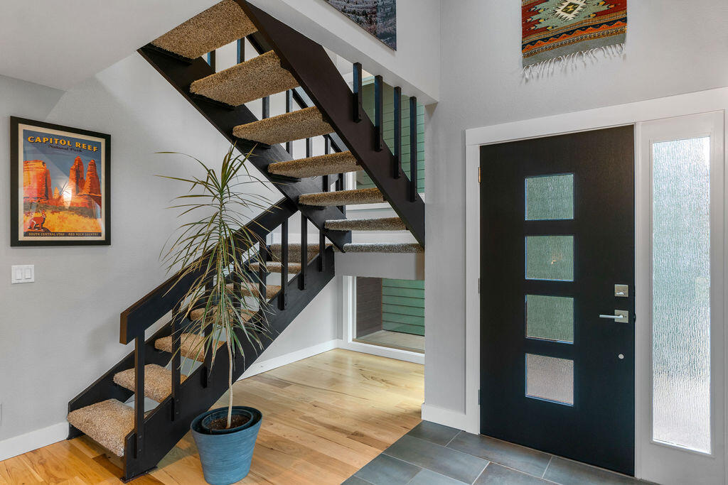 62508 Quail Ridge Road Bend, OR 97701 - Photo 4 of 36 a view of entryway and hall with wooden floor