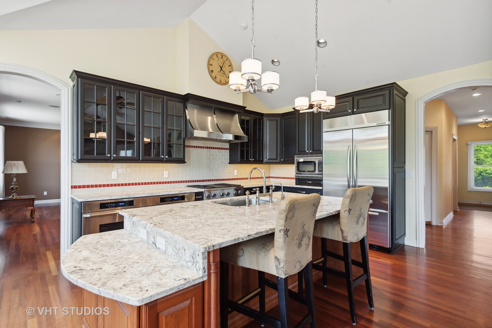 10701 Knickerbocker Road Harvard, IL 60033 - Photo 14 of 46 a kitchen with a table and chairs in it