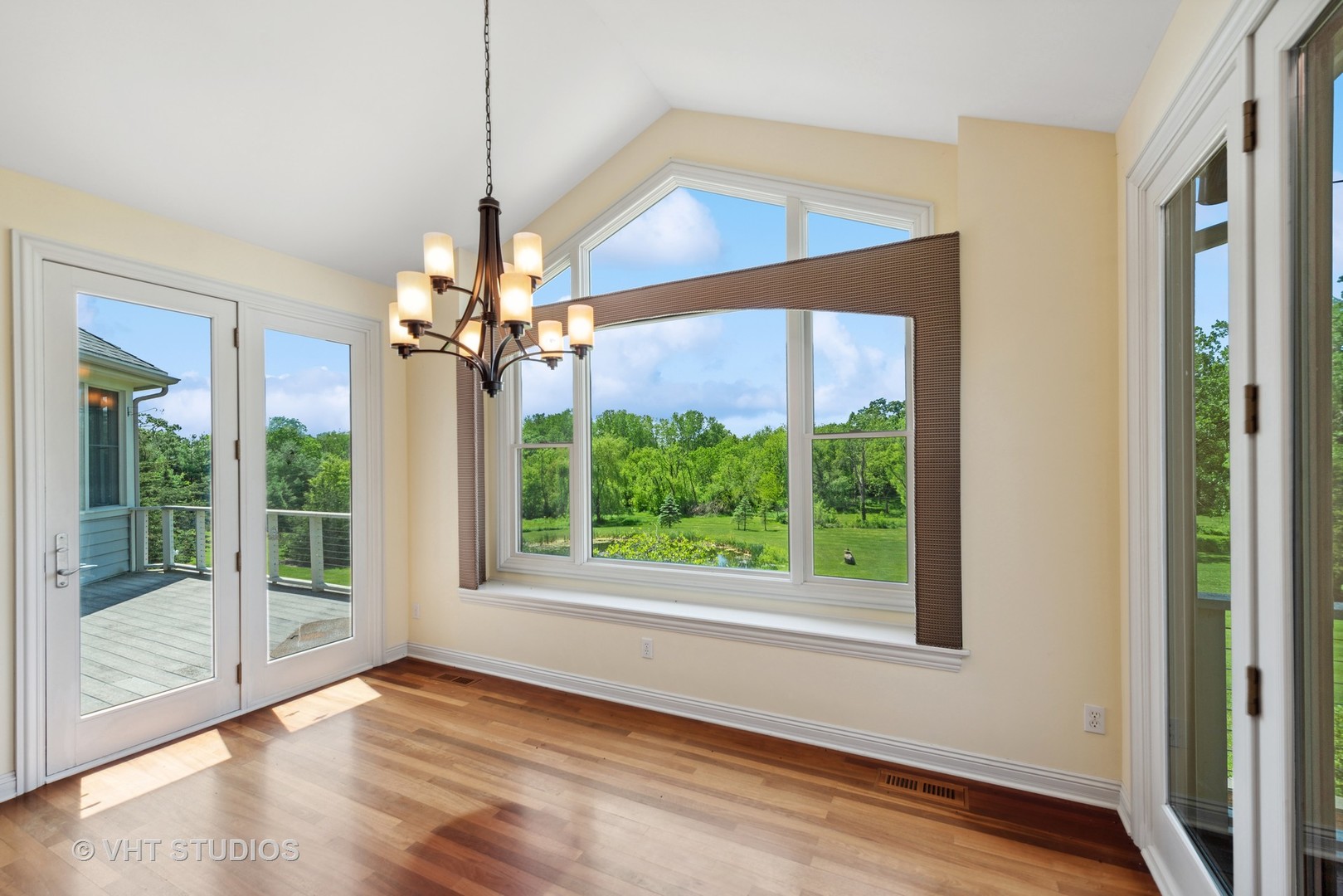 10701 Knickerbocker Road Harvard, IL 60033 - Photo 16 of 46 a view of a livingroom with a ceiling fan and window