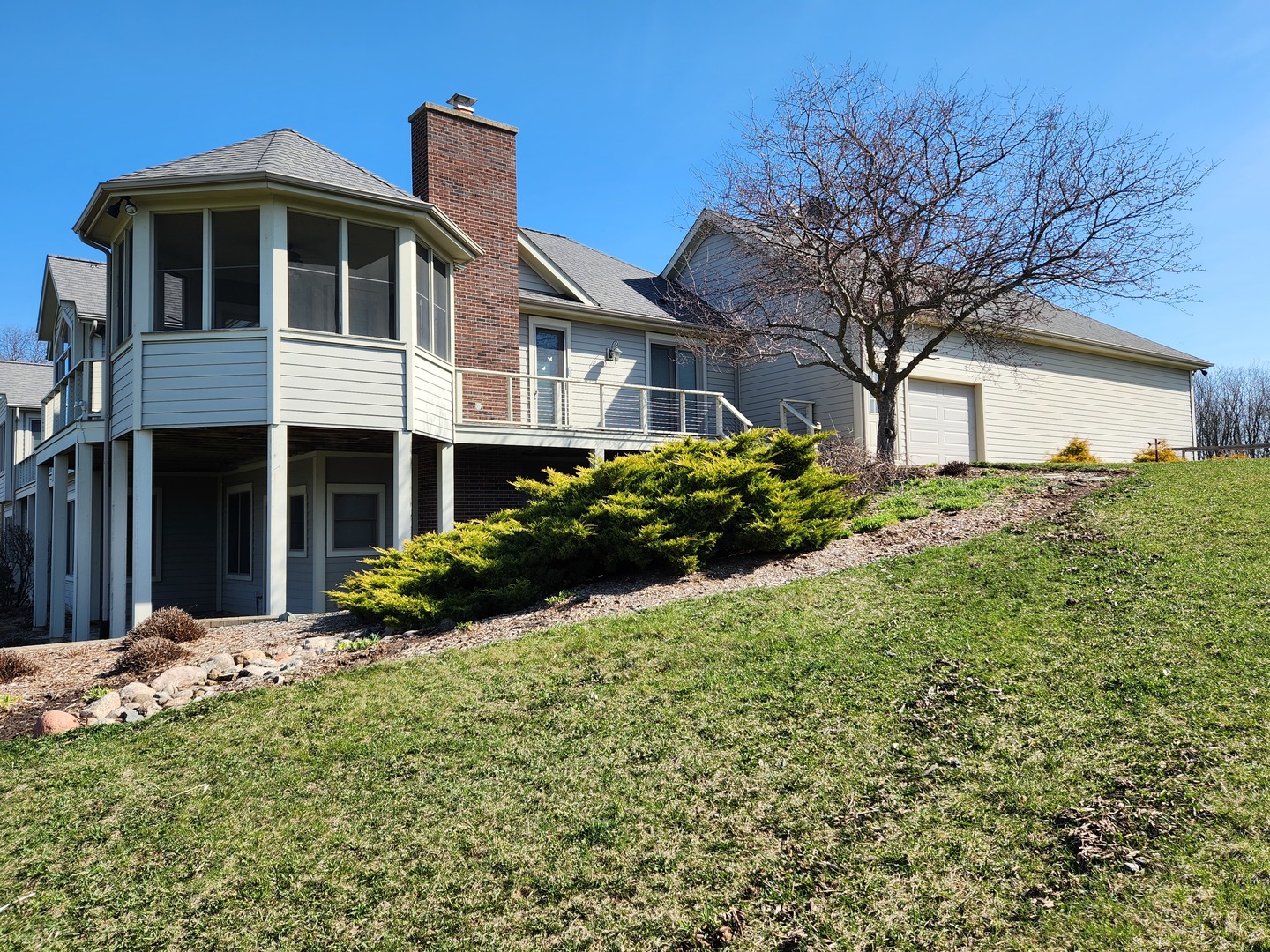 10701 Knickerbocker Road Harvard, IL 60033 - Photo 36 of 46 a front view of a house with a yard