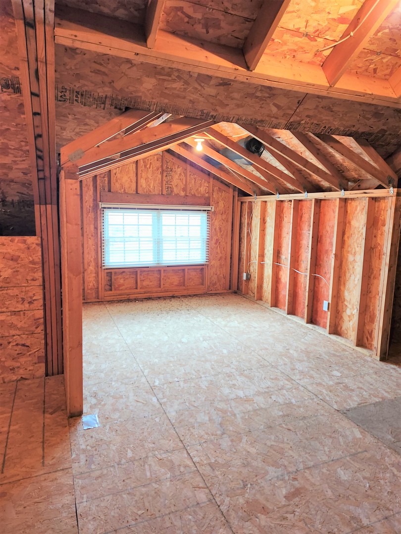 10701 Knickerbocker Road Harvard, IL 60033 - Photo 41 of 46 a view of a room with a wooden fence