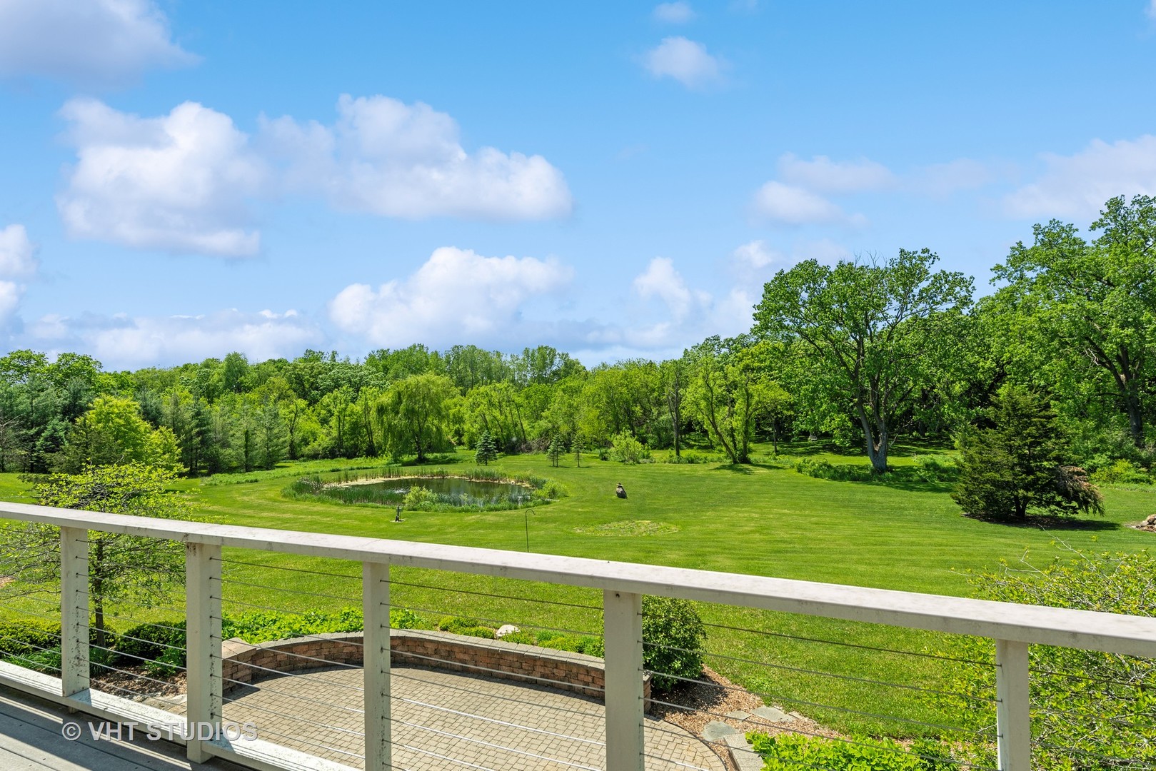 10701 Knickerbocker Road Harvard, IL 60033 - Photo 6 of 46 a view of a park and a big yard
