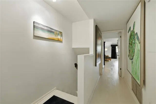 a bed room with a bed window and a chair