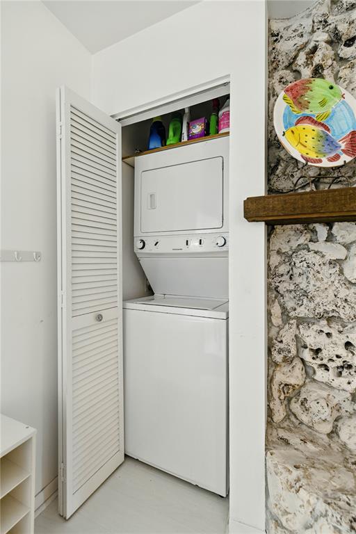 9951 Southwest 88th Court Road, Unit B Ocala, FL 34481 - Photo 24 of 29 a utility room with dryer and washer