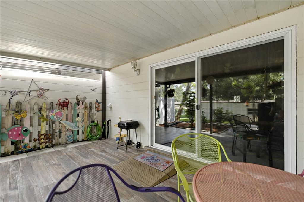 9951 Southwest 88th Court Road, Unit B Ocala, FL 34481 - Photo 25 of 29 a room with furniture and a window