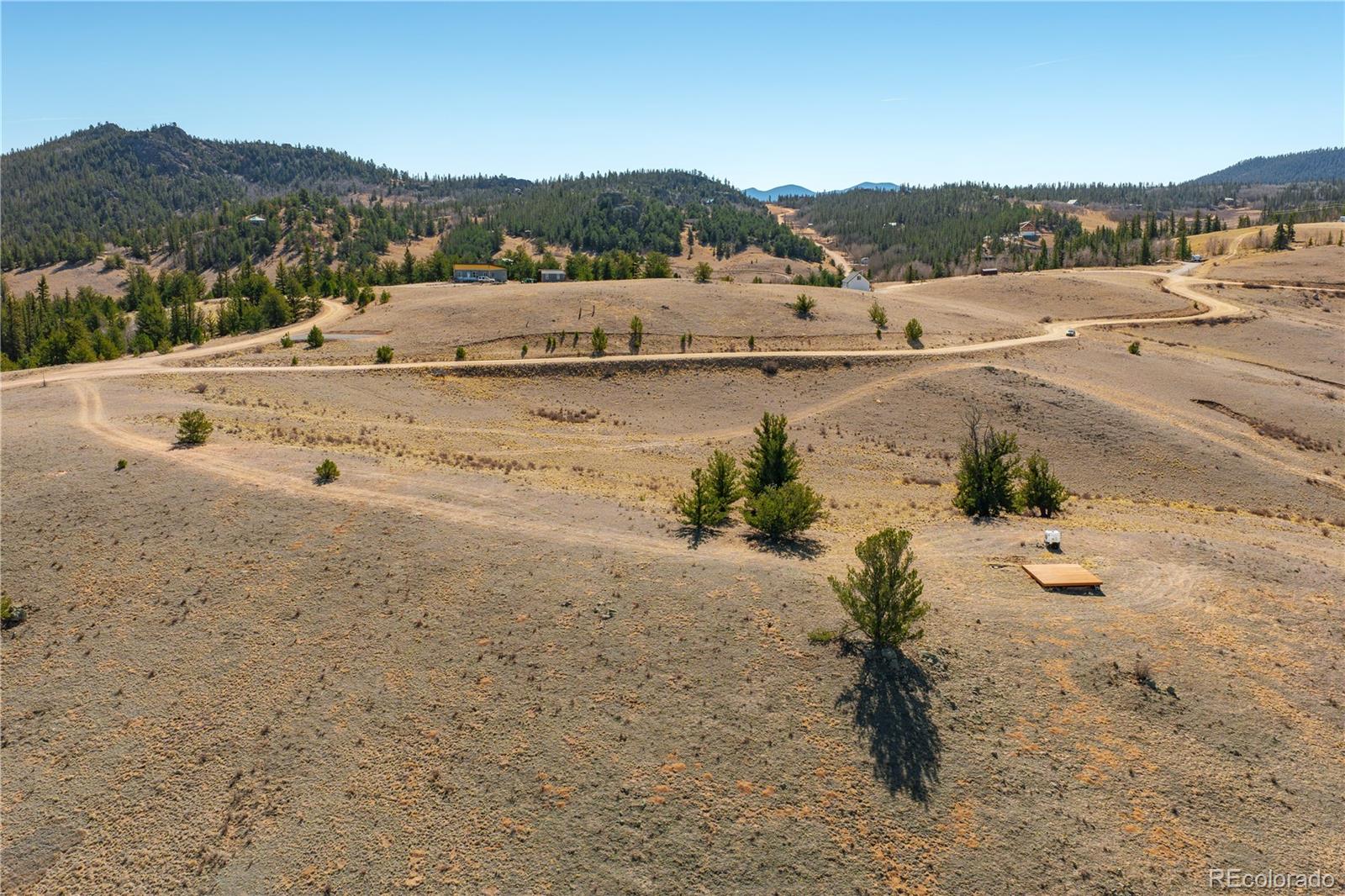 1457 Lippzana Road Jefferson, CO 80456 - Photo 18 of 29 a view of a road with an ocean view