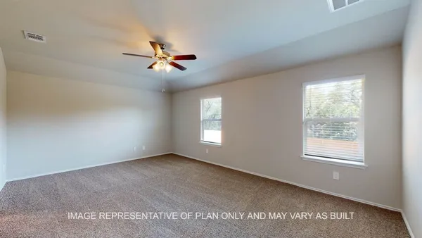 a view of a big room with carpet