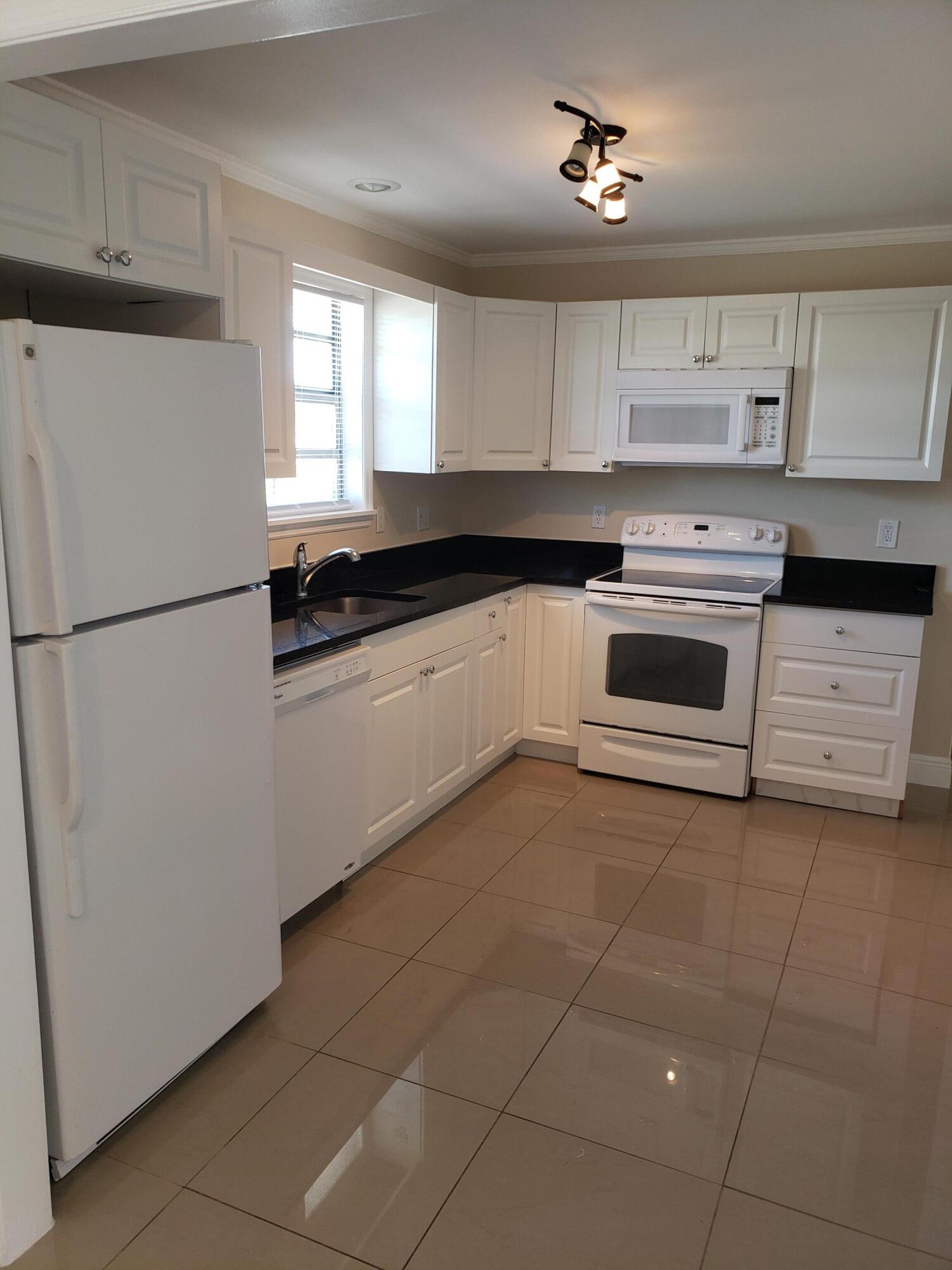 1501 West 19th Street Riviera Beach, FL 33404 - Photo 17 of 36 20220512_151812