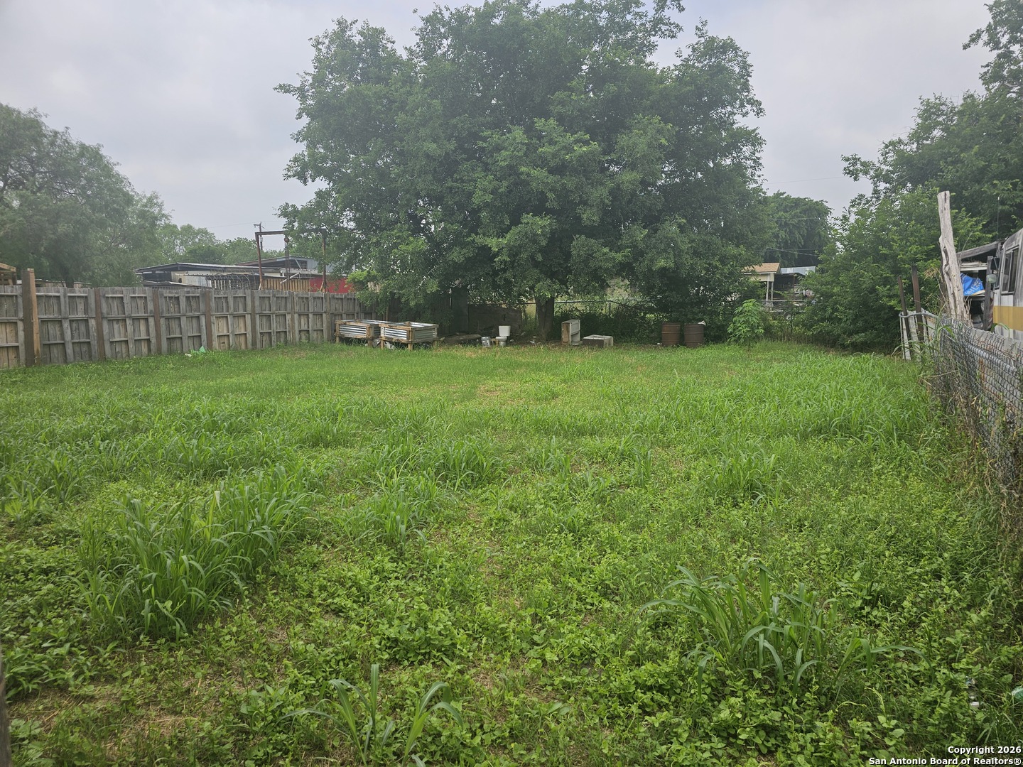 907 Hough Adkins, TX 78101 - Photo 2 of 10 a view of a backyard with a garden