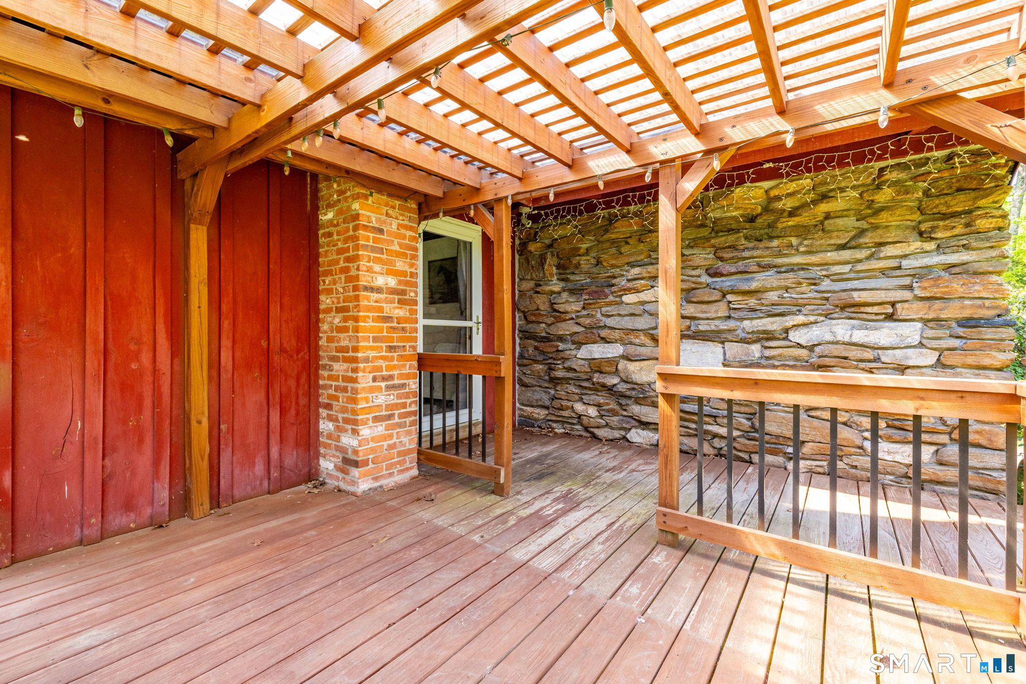 250 Center Hill Road Barkhamsted, CT 06063 - Photo 25 of 40 a view of outdoor space with wooden deck and furniture