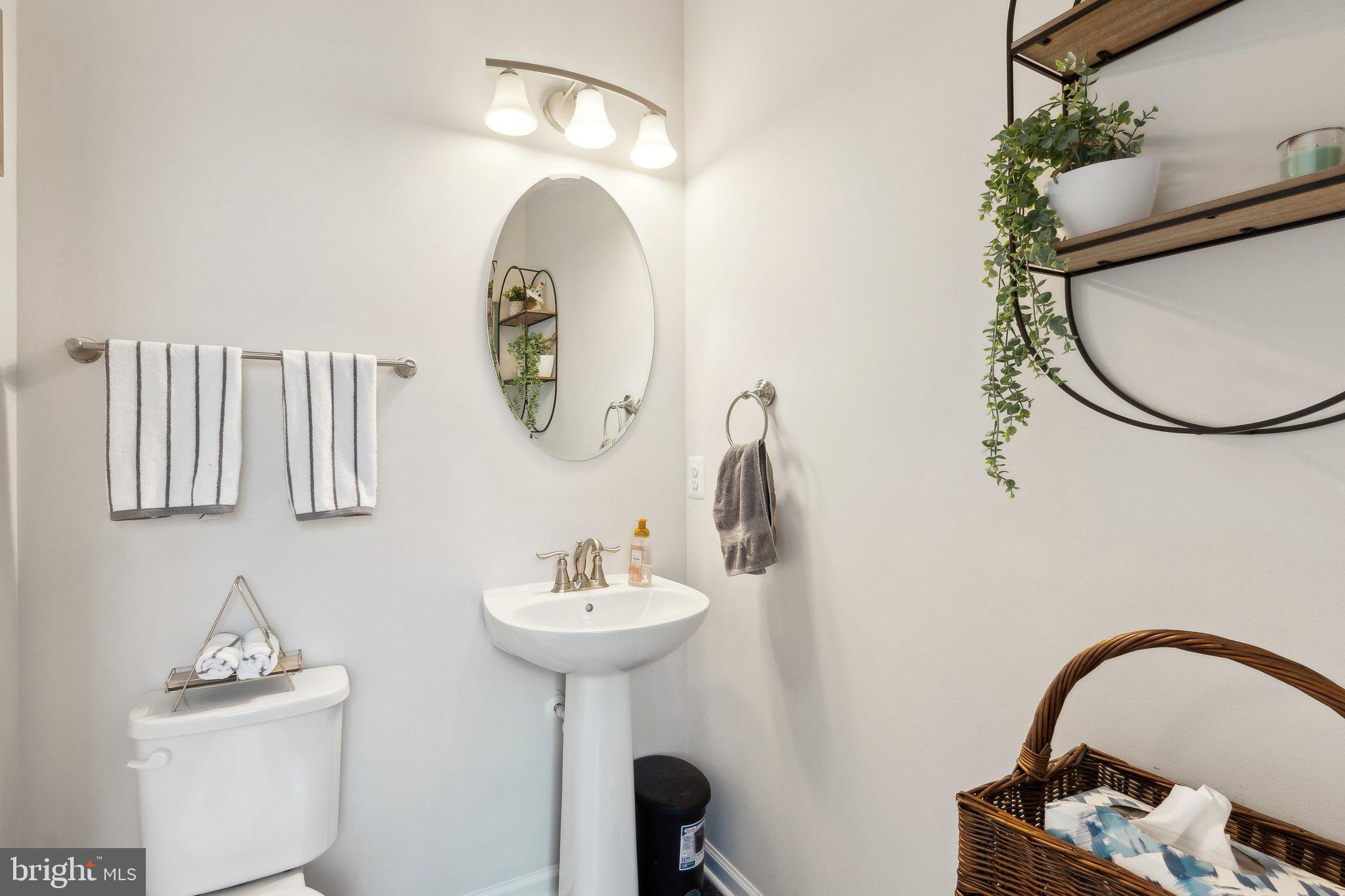 3012 Shaws Road Edgemere, MD 21219 - Photo 14 of 57 a bathroom with a sink and a mirror