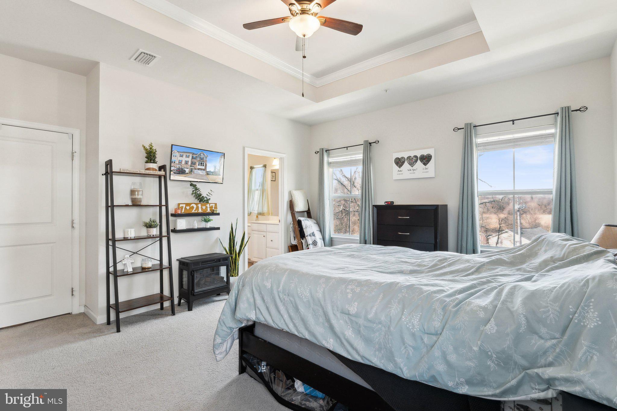 3012 Shaws Road Edgemere, MD 21219 - Photo 19 of 57 a bedroom with a bed and a cabinets