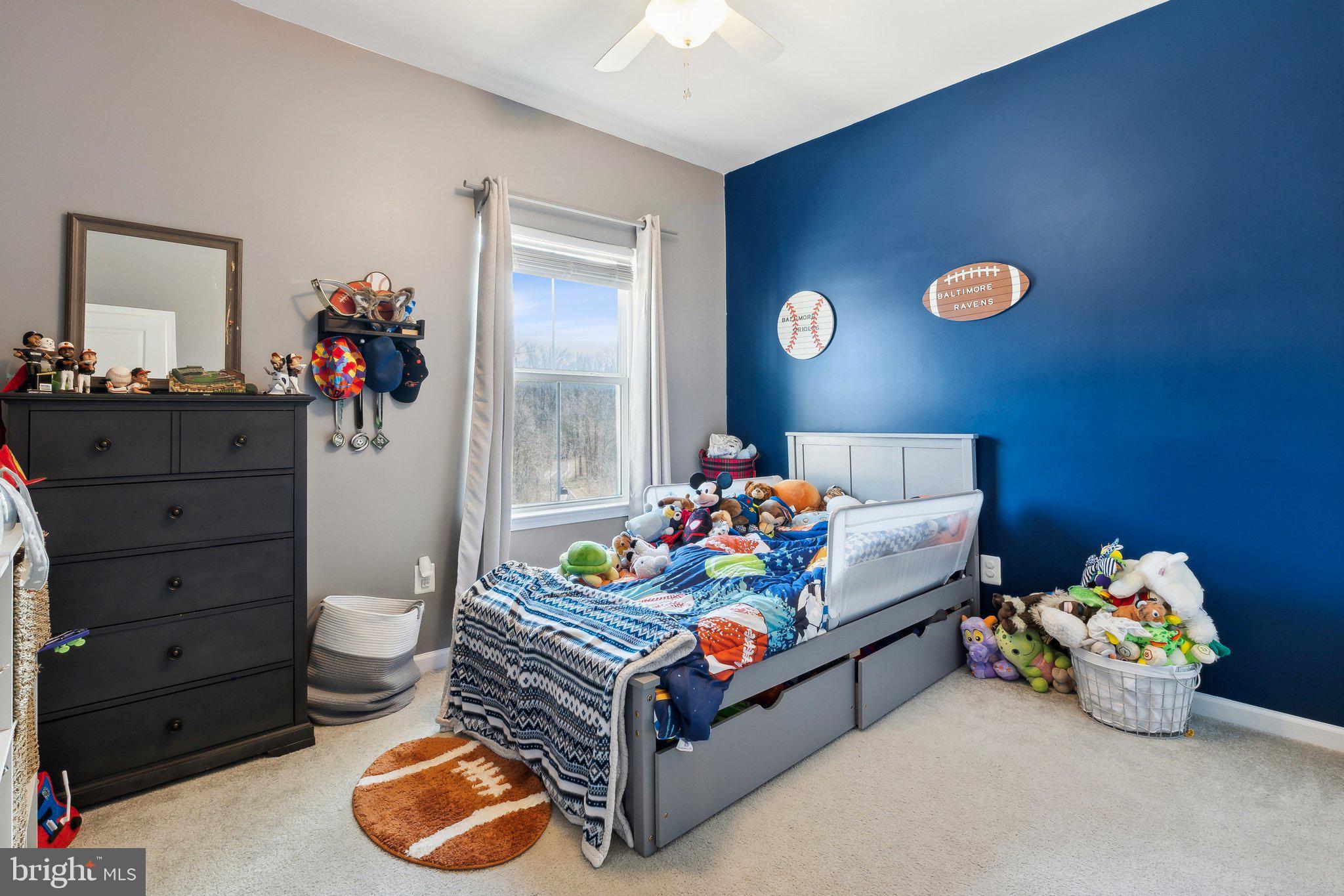 3012 Shaws Road Edgemere, MD 21219 - Photo 21 of 57 a bed room with furniture and a window