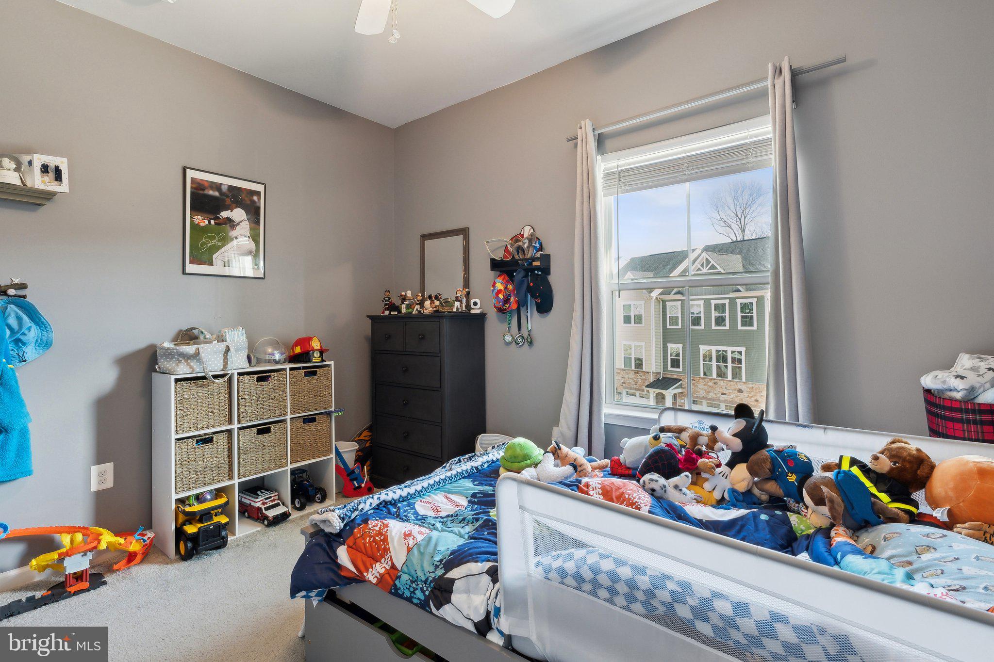 3012 Shaws Road Edgemere, MD 21219 - Photo 22 of 57 a bed room with a bed and a window