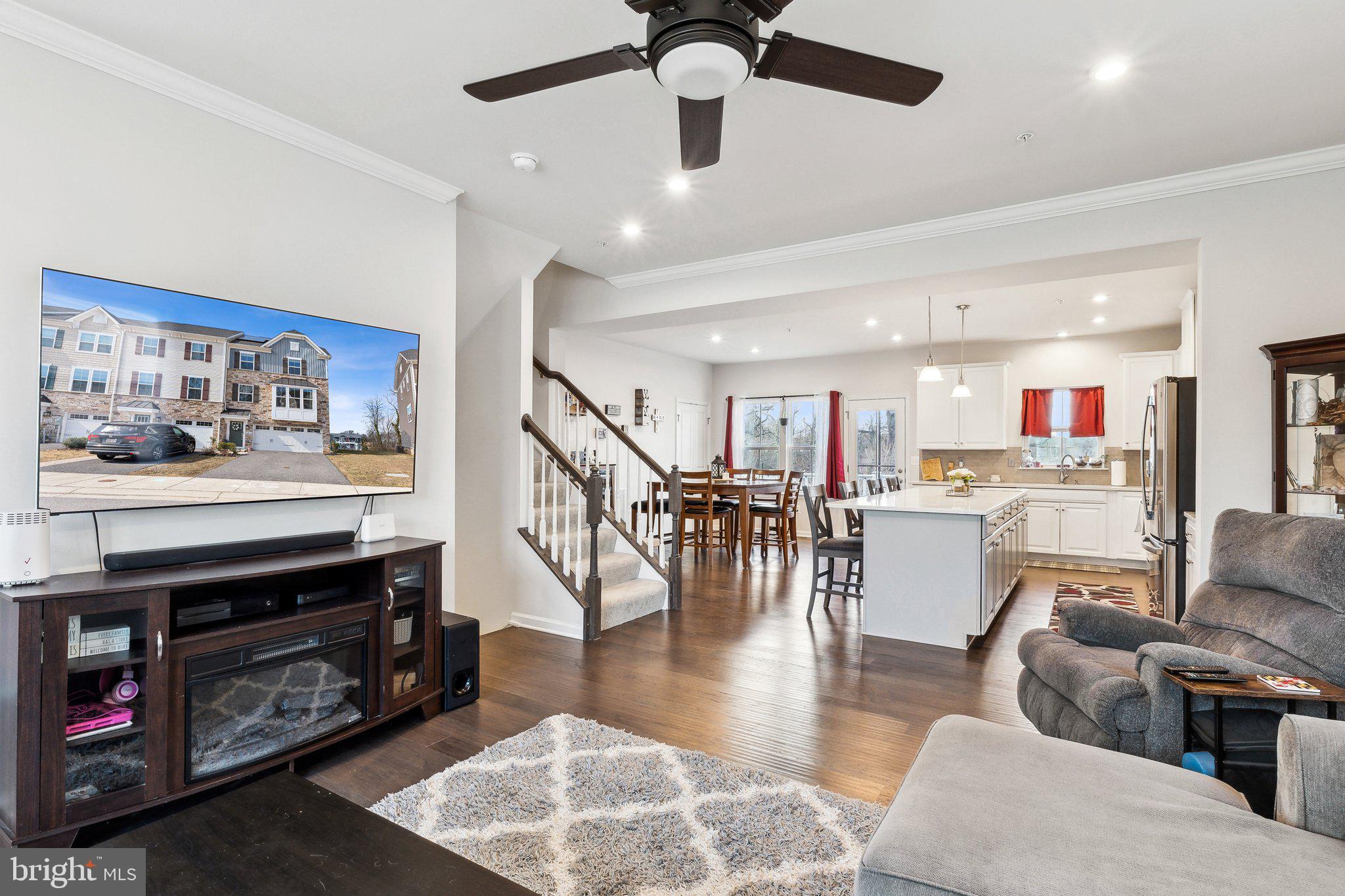 3012 Shaws Road Edgemere, MD 21219 - Photo 6 of 57 a living room with furniture and kitchen view