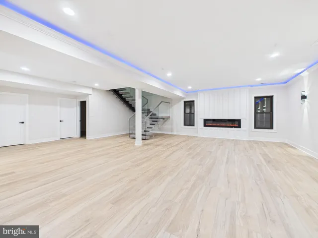 a bathroom with a sink a shower and a mirror