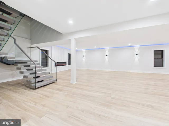a bathroom with a bathtub and a sink