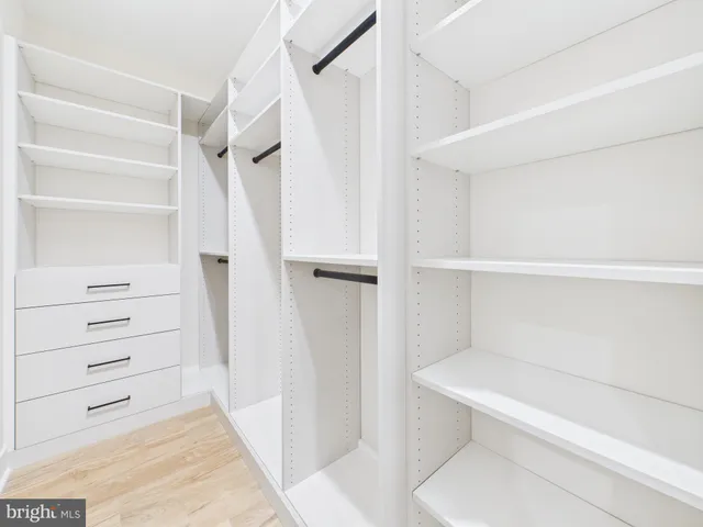 a bathroom with a toilet sink and shower