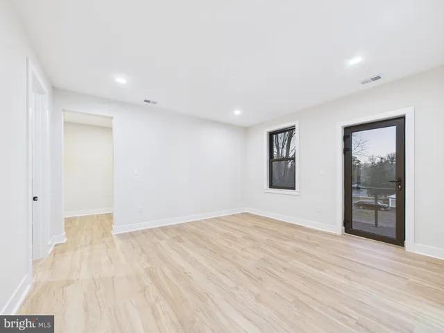 a refrigerator freezer sitting inside of a kitchen