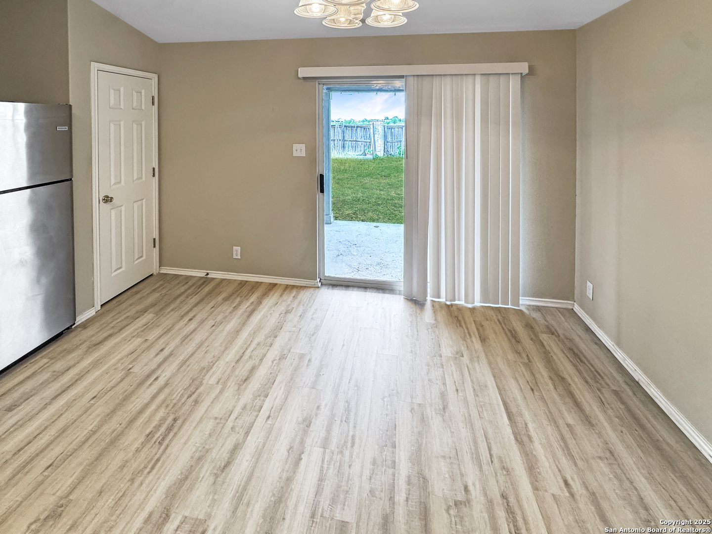 312 Hummingbird Drive New Braunfels, TX 78130 - Photo 12 of 20 a view of a house with wooden floor
