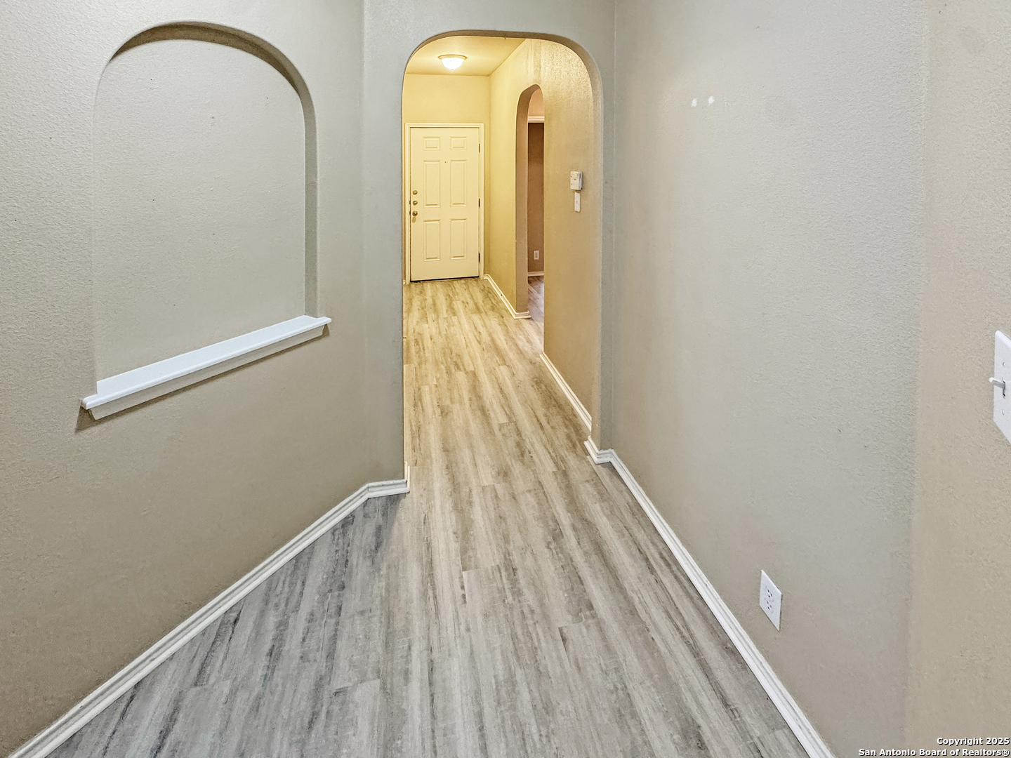 312 Hummingbird Drive New Braunfels, TX 78130 - Photo 15 of 20 a view of a room with wooden floor