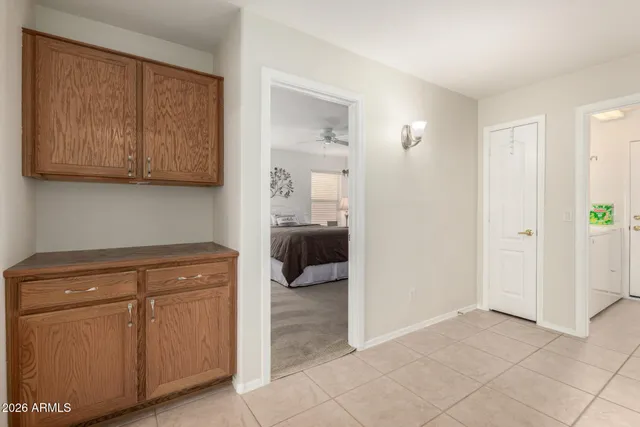 a view of a kitchen with storage and utility