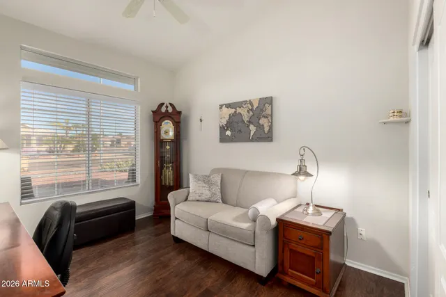 a living room with furniture and a window