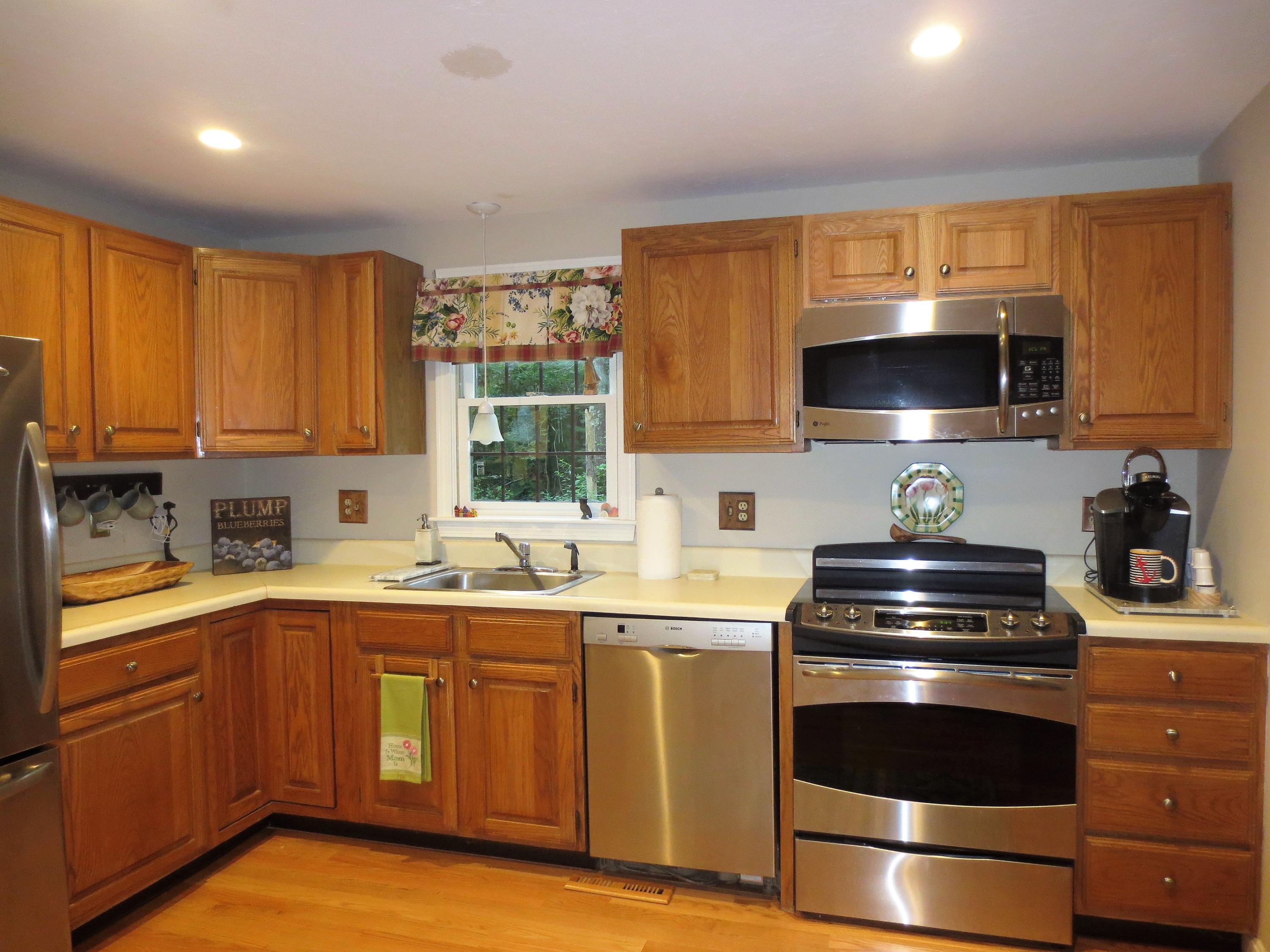 156 Braley Jenkins Road Centerville, MA 02632 - Photo 18 of 33 a kitchen with a sink and steel appliances
