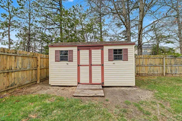a front view of a house with a garage