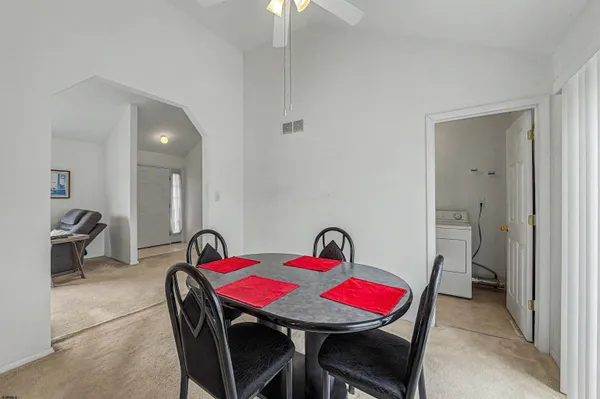a view of a dining room with furniture