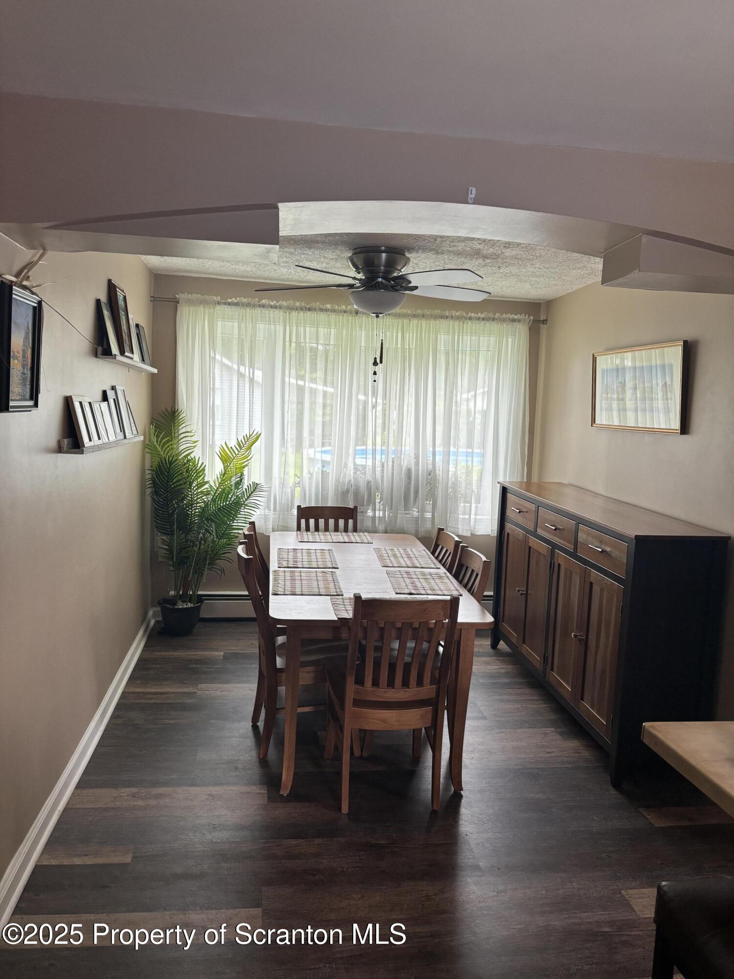 5036 Rear Birney Moosic, PA 18507 - Photo 24 of 35 a view of a dining room with furniture window and wooden floor