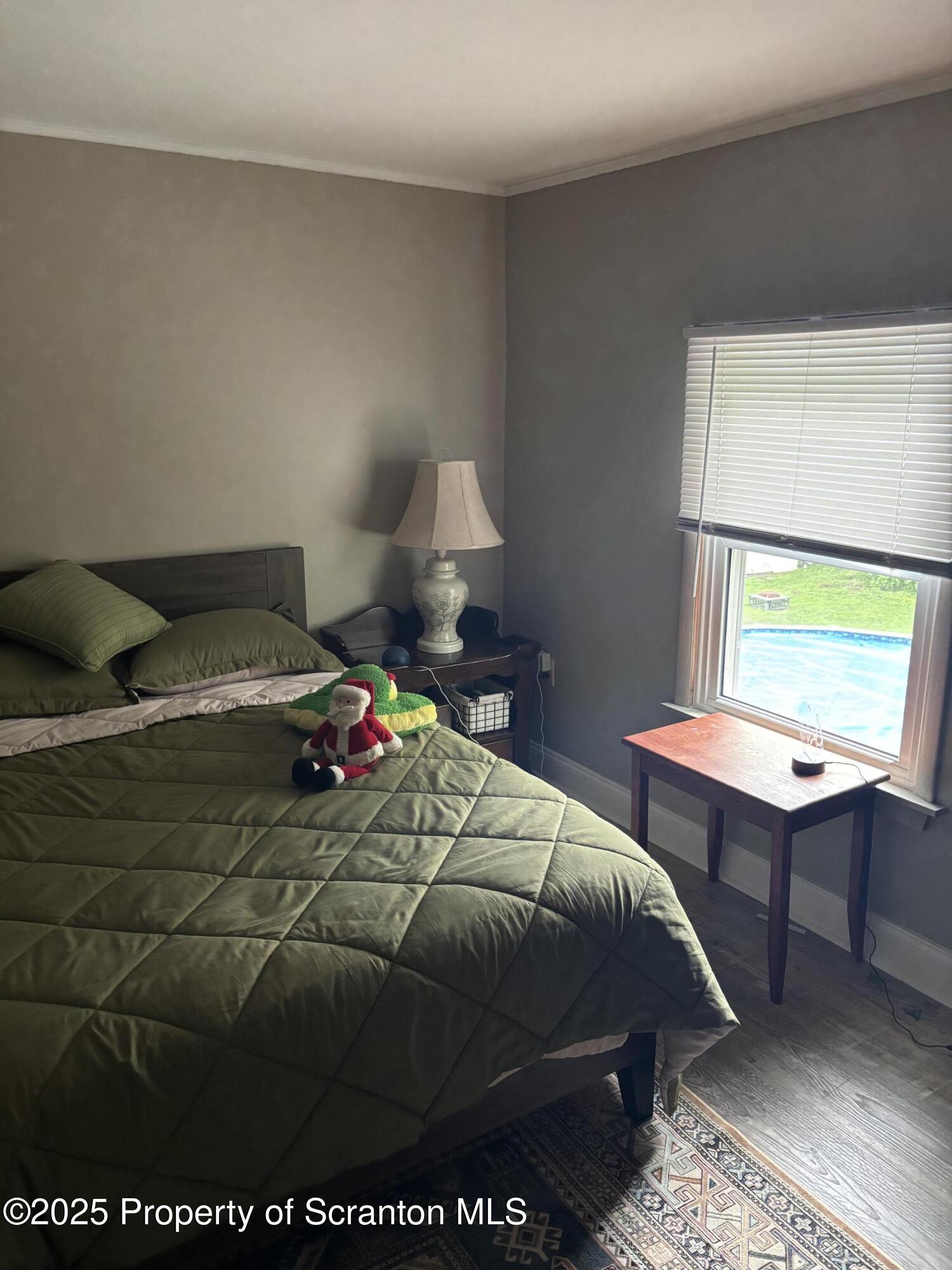 5036 Rear Birney Moosic, PA 18507 - Photo 32 of 35 a bedroom with a bed a desk and chair