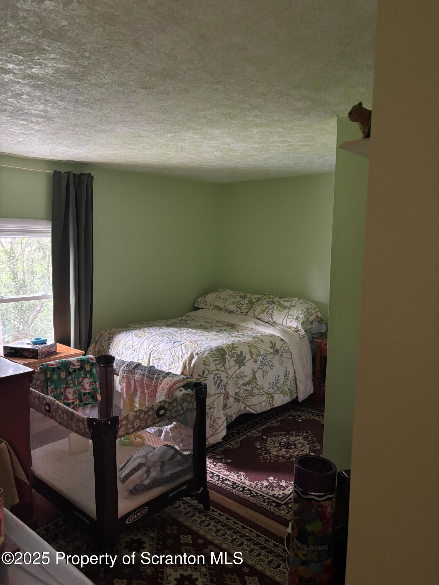 5036 Rear Birney Moosic, PA 18507 - Photo 33 of 35 a bedroom with a bed and window