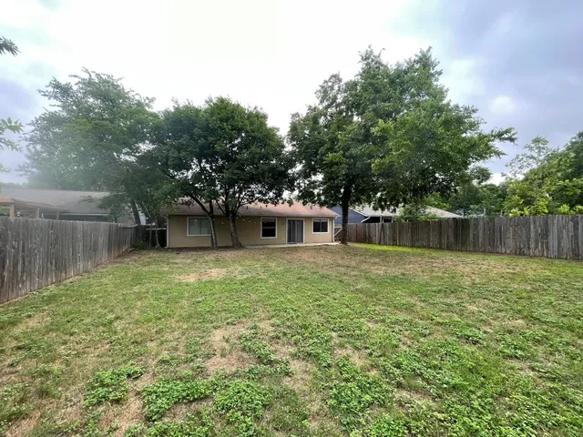 a house view with a garden space
