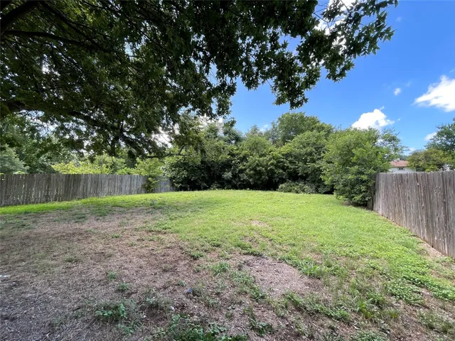 a view of outdoor space and yard