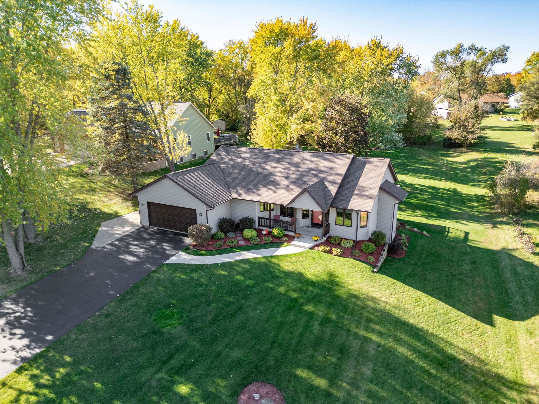 13546 Racoon Run Roscoe, IL 61073 - Photo 1 of 37 an aerial view of a house with swimming pool garden and patio