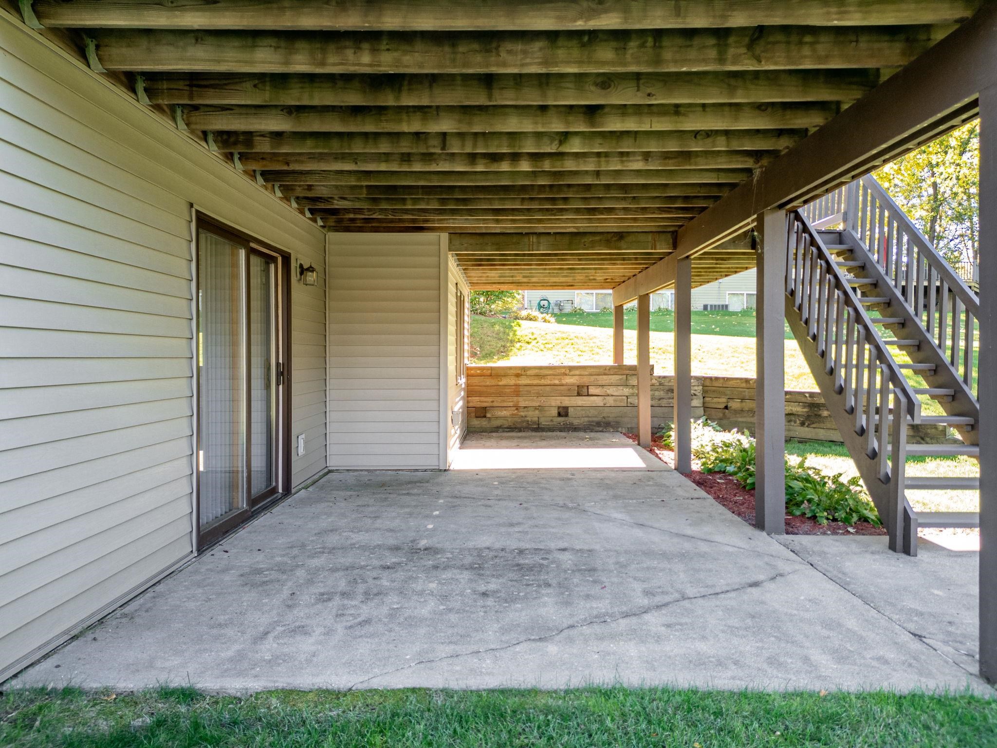 13546 Racoon Run Roscoe, IL 61073 - Photo 32 of 37 a view of backyard with porch
