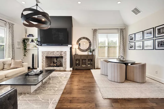 a kitchen with a sink stove top oven and refrigerator