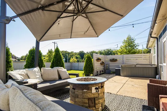 a view of a balcony with a stove and a window