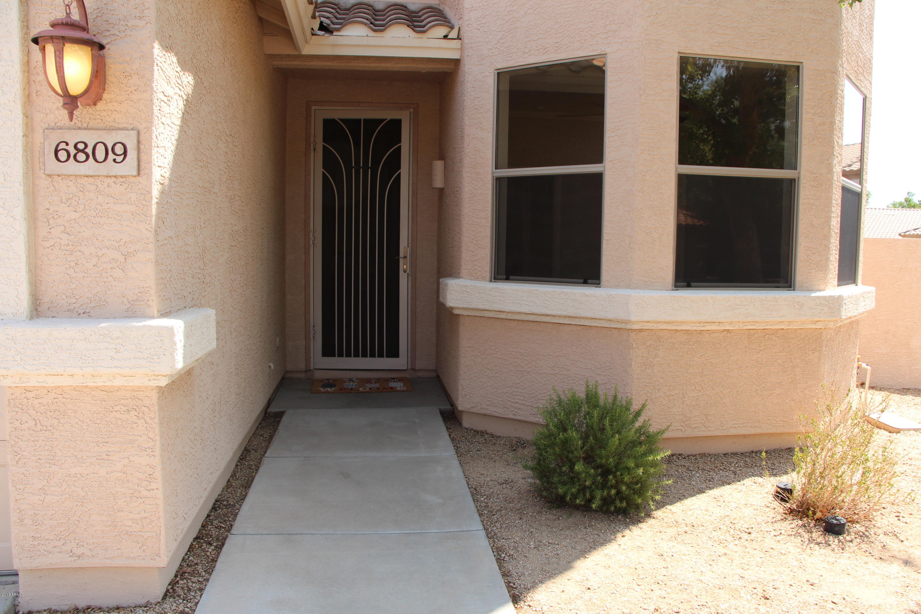 6809 West Rowel Road Peoria, AZ 85383 - Photo 4 of 64 Front 4