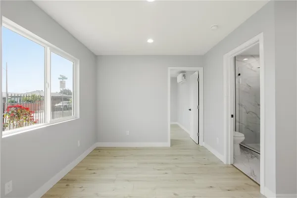 a view of an empty room with a window