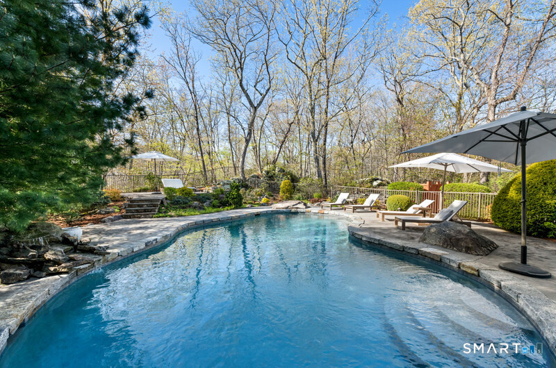 30 Catbrier Road Weston, CT 06883 - Photo 24 of 26 a view of swimming pool with outdoor seating and plants