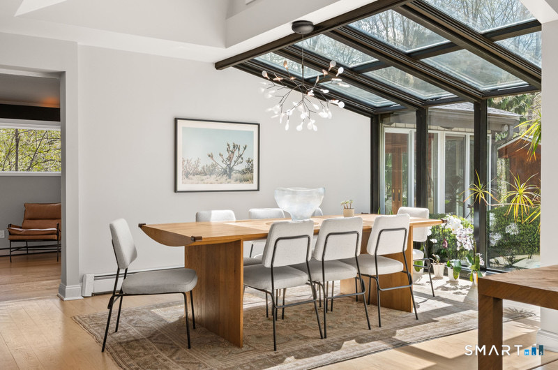 30 Catbrier Road Weston, CT 06883 - Photo 6 of 26 a view of a dining room with furniture window and outside view