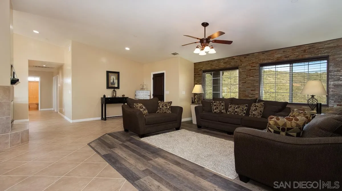 12951 Rancho Heights Road Pala, CA 92059 - Photo 5 of 41 a living room with furniture and a large window