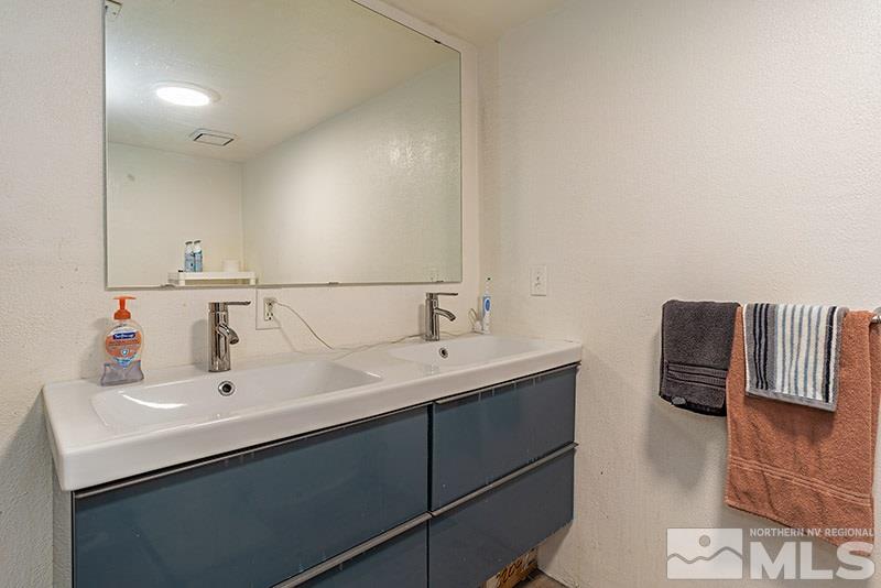 760 West Street Reno, NV 89503 - Photo 12 of 17 a bathroom with a sink and a mirror
