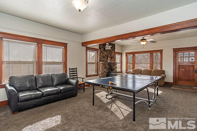 760 West Street Reno, NV 89503 - Photo 3 of 17 a living room with furniture a table and potted plants