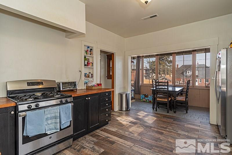760 West Street Reno, NV 89503 - Photo 5 of 17 a kitchen with a stove and wooden floor