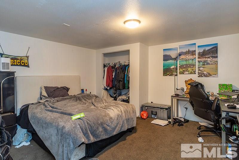 760 West Street Reno, NV 89503 - Photo 10 of 17 a bed room with a bed and a desk